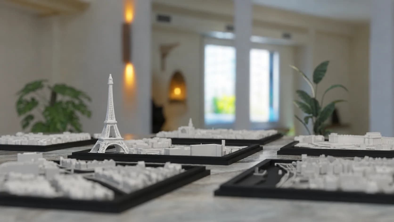 3D-geprint stadsmodel met gebouwen, straten en water in aparte kleuren